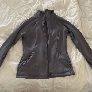 Gray women’s north face zip jacket